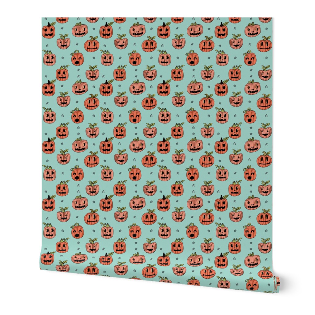 Jack-o'-lantern halloween cute pumpkin carving hand drawn pattern light blue by andrea lauren