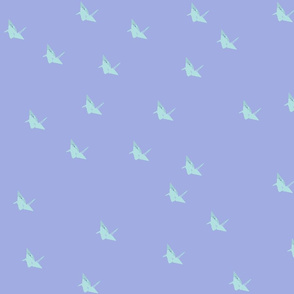 flocks of small origami cranes