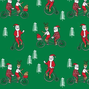 Santa Claus bicycle with reindeer christmas fabric green