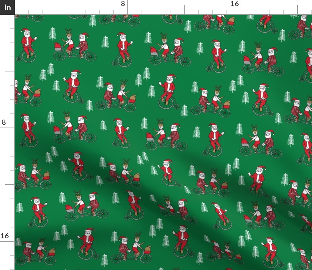 Santa Claus bicycle with reindeer christmas fabric green
