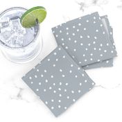 Abstract snow flakes and dots textured speckles winter ice gray