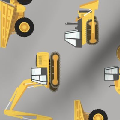 (large) construction trucks - yellow on grey