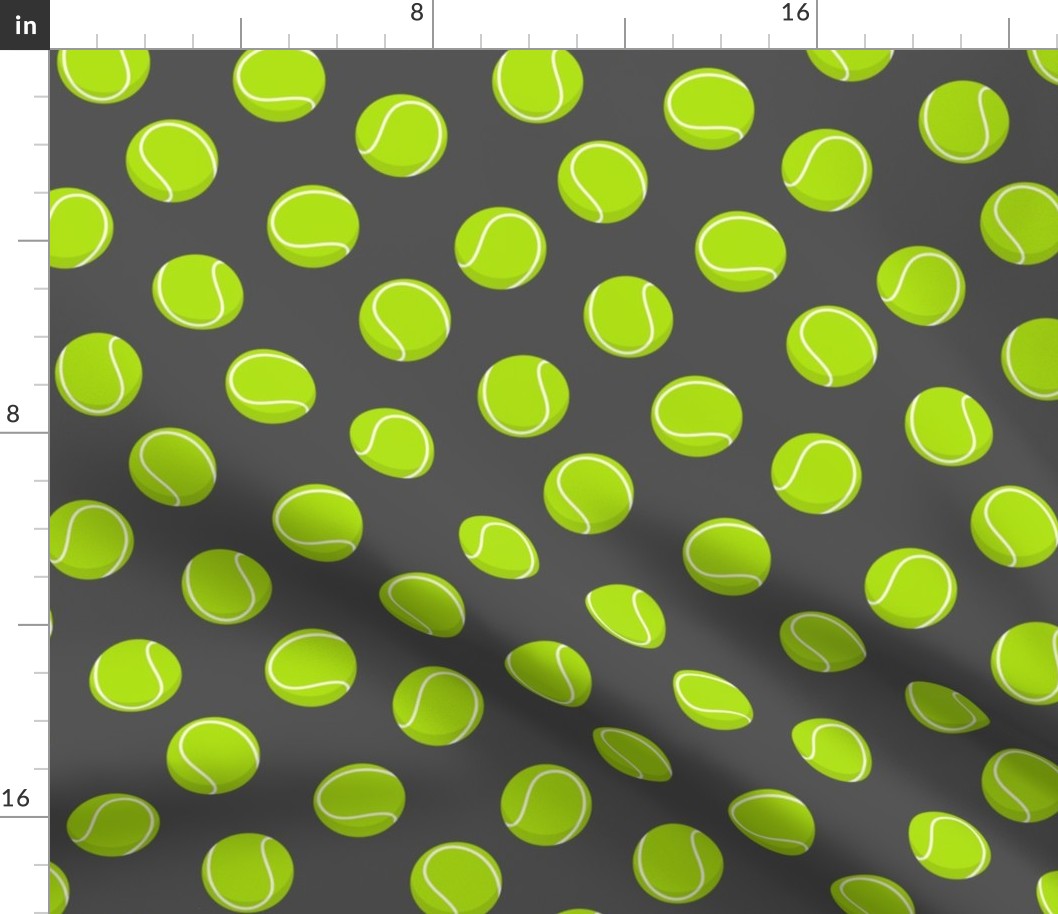 tennis ball on dark grey