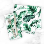 Watercolor tropic jungle seamless summer pattern background with tropical palm monstera leaves