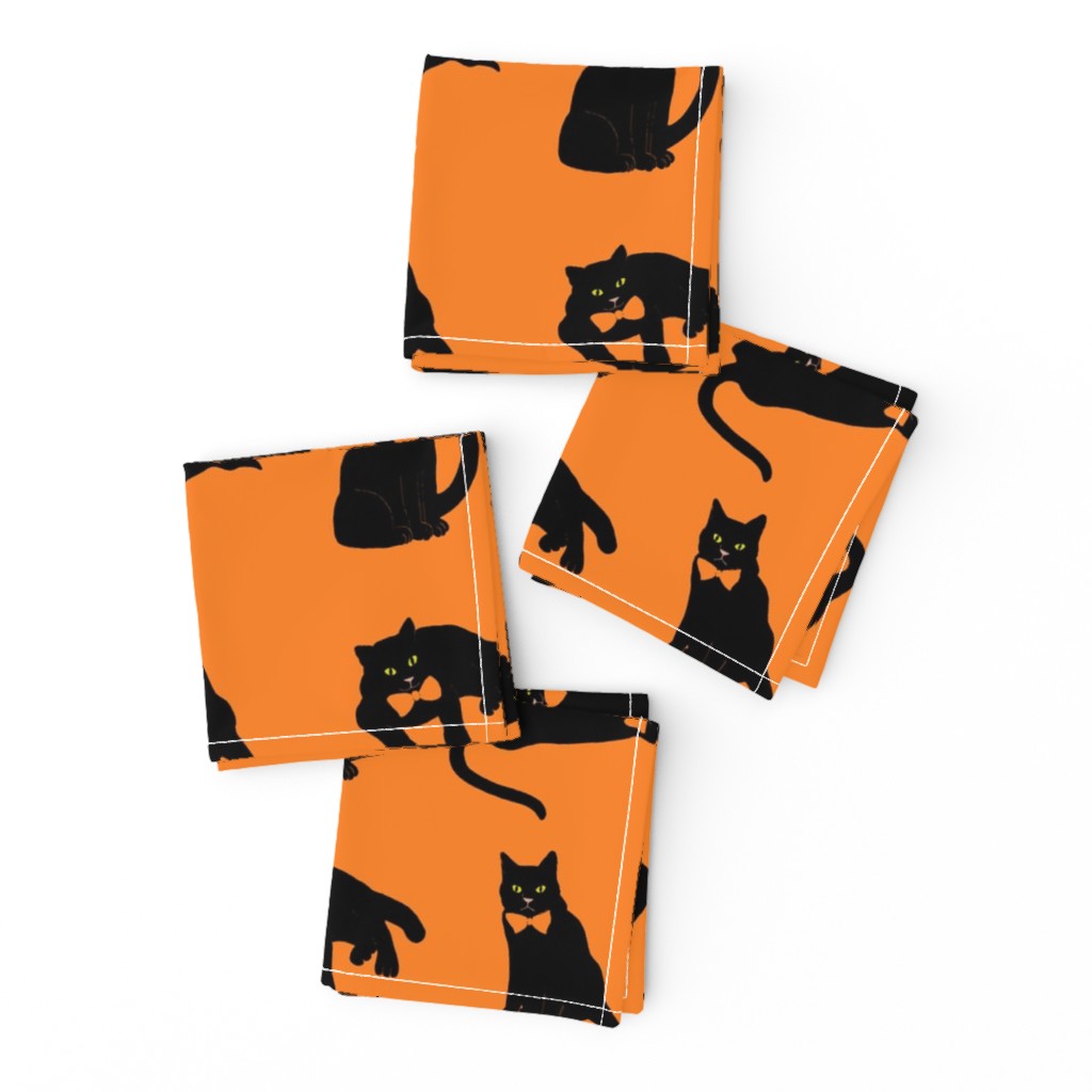 black cats on orange Halloween