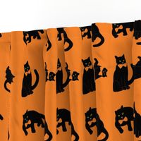 black cats on orange Halloween