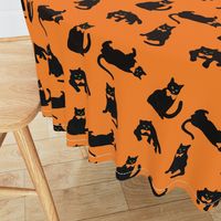 black cats on orange Halloween