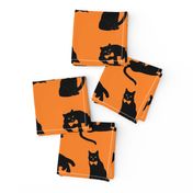 black cats on orange Halloween