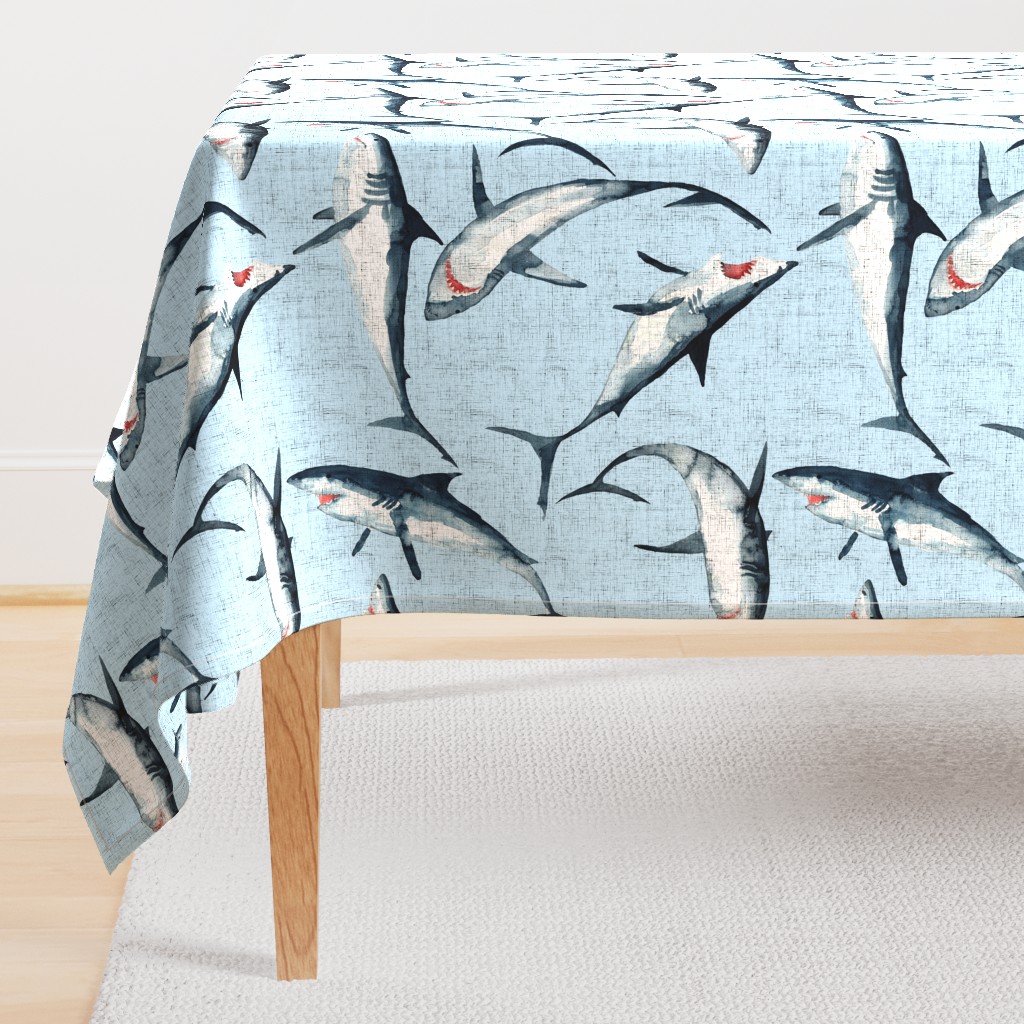 Great Whites are great! Sharks on a woven blue background