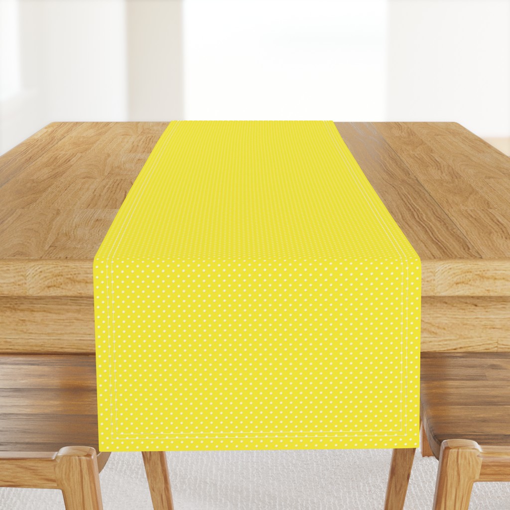 White polka dots on yellow