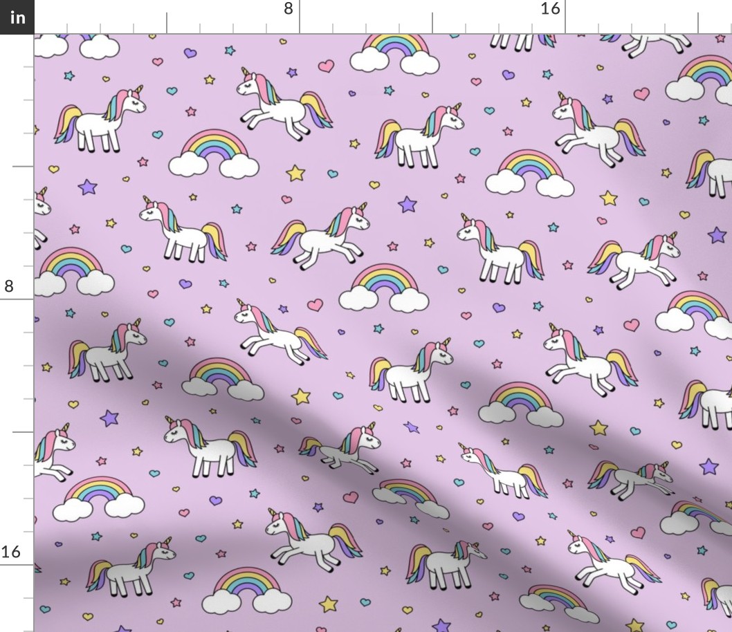 unicorns with rainbows (pastel) on purple