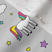 unicorns with rainbows (bright) on grey