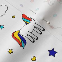 unicorns with rainbows (primary) on white