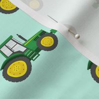 green tractors on blue - farm fabrics