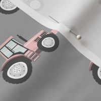 light pink tractors on grey - farm fabric