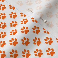 Half Inch Orange Paw Prints on White