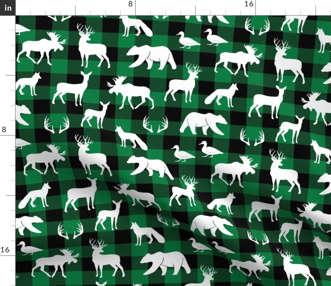 woodland animals on green plaid