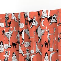 Vintage Halloween pinups in pumpkin orange