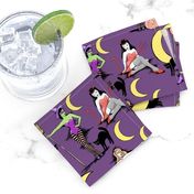 Retro Halloween pinups in muted purple