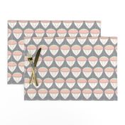 coral pink acorns on solid grey background