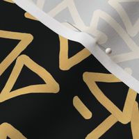 Tossed Gold Foil Triangles on Black Upholstery Fabric 