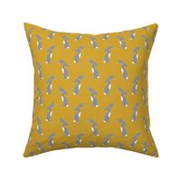 Grey and white hares on mustard yellow