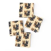 german shepherd dogs with puppy on yellow-brown background