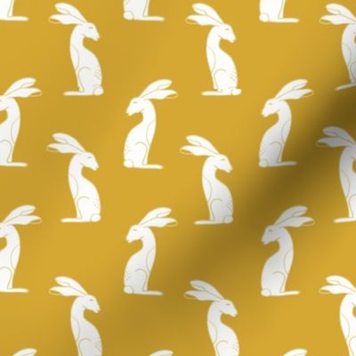 White rabbits on mustard yellow