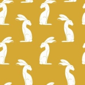 White rabbits on mustard yellow