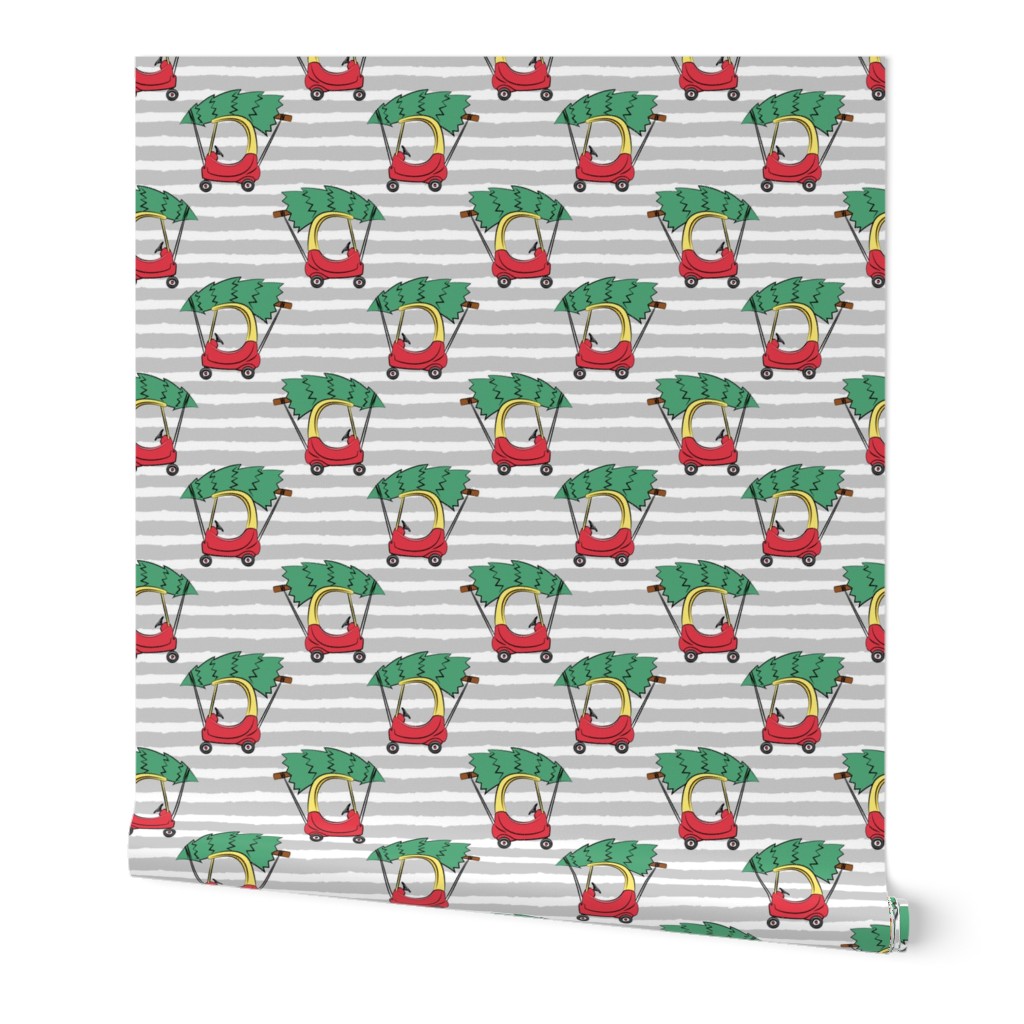 kids car with Christmas tree on grey stripes