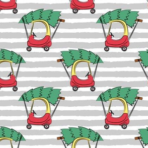 kids car with Christmas tree on grey stripes