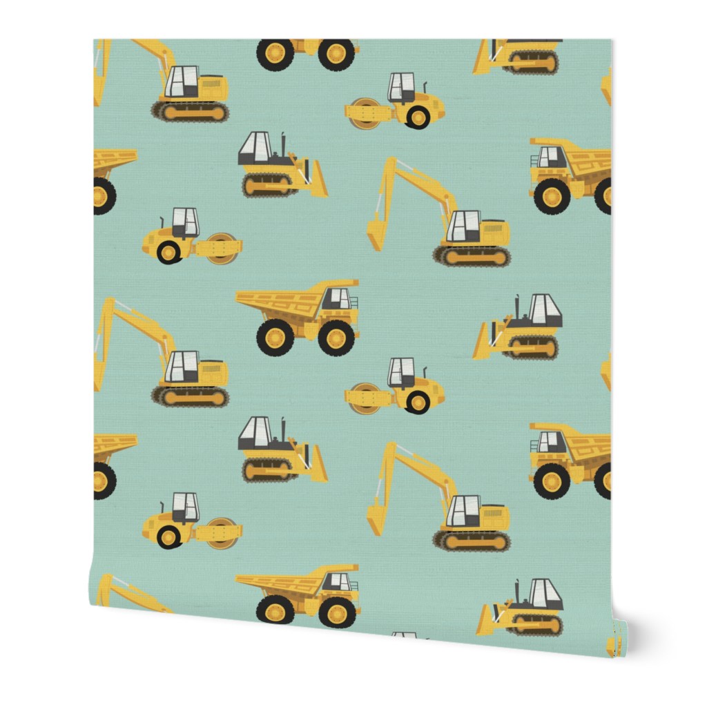 (large scale) construction trucks - yellow on dark mint