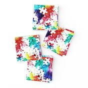 autism awareness - watercolor puzzle pieces with splatter