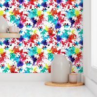 autism awareness - watercolor puzzle pieces with splatter