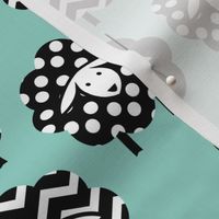 BLACK AND WHITE SHEEP ON MINT