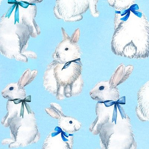 White rabbits on blue background