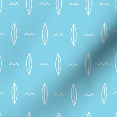 Minimal surfboards on blue