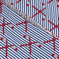 hockey sticks on stripes - red and blue