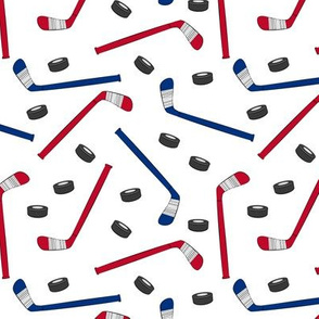 hockey sticks and pucks - red and blue