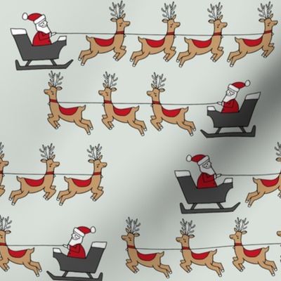 santa's sleigh fabric // reindeer and santa north pole christmas design - mint