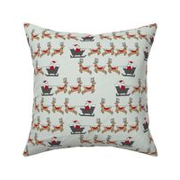 santa's sleigh fabric // reindeer and santa north pole christmas design - mint