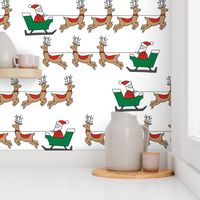 santa's sleigh fabric // reindeer and santa north pole christmas design -red and green