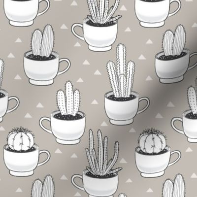 white cactus-in-teacups-on-linen