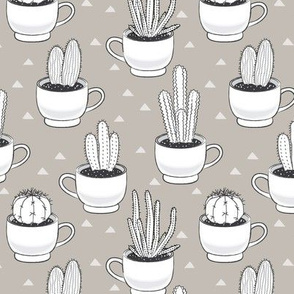 white cactus-in-teacups-on-linen