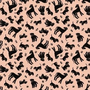 Black dogs on pink
