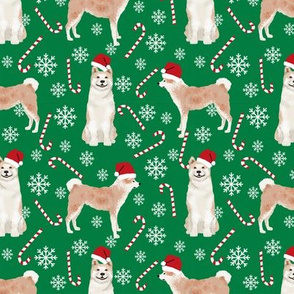 Akita dog breed christmas peppermint sticks candy canes fabric green