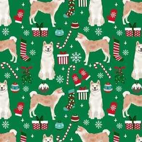 Akita dog breed christmas presents  candy canes snowflakes fabric green