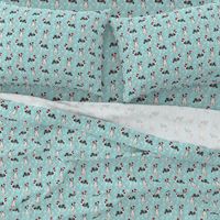 Border Collie blue merle peppermint stick candy canes winter snowflakes dog fabric light blue