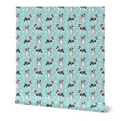 Border Collie blue merle peppermint stick candy canes winter snowflakes dog fabric light blue