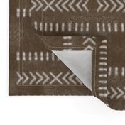 Minimalist Tribal Pattern on Brown